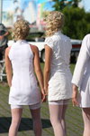 Parade of blondes 2011 (looks: white fishnet stockings with lace top, white bathrobe, white stockings with lace top, blond hair)