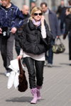 Street fashion in Minsk. Spring 2011 (looks: black quilted jacket, black trousers, fur brown bag, lilac fringe lowboots)
