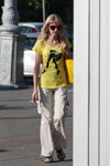 Minsk street fashion. 05/2011 (looks: yellow top, white trousers, Sunglasses, blond hair)