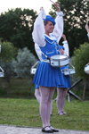 Natallia Paulouskaja. Drummer girls (looks: white tights, sky blue beret, sky blue pleated skirt, black pumps, sky blue mini pleated skirt)