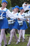 Drummer girls (looks: sky blue beret, white tights, sky blue mini pleated skirt, black pumps)