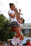 "Jamaica" Girl band (looks: white knee-highs, black pumps, , checkered mini skirt; person: Erzhena Sanzhiyeva)