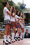 Short plaid minis and white knee-highs: a sizzling performance by the girls from the band "Jamaica"