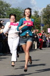 Running in heels. 2012 (looks: blue denim shorts)