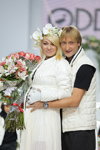 Yana Rudkovskaya and Evgeni Plushenko. Odri show — Volvo-Fashion Week in Moscow SS13