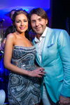 Olivia Culpo and Andrey Malakhov. Olivia Culpo. "Amor" (looks: white shirt, turquoise blazer)