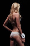 Lingerie competition. "Fotomodel" (looks: white briefs, blond hair)
