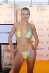 Extreme Intimo show — Lingerie-Expo 2013 (looks: multicolored swimsuit with ties, blond hair)