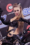 Catgirls — Motorshow 2013 (looks: blond hair, black long leather gloves, black leather bustier)