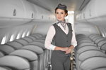 Нова форма бортпровідників авіакомпанії "Білавіа" (наряди й образи: сіра пілотка, сірий жилет, біла блуза, сірі брюки)
