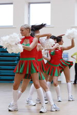 cheerleading uniform (looks: white sneakers, white leg warmers, whitepom-pom)