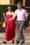 Minsk street fashion. 07/2013 (looks: red sundress, yellow bag, black sandals, pink shirt, grey men's suit, black pumps)