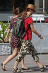 Minsk street fashion. 08/2013 (looks: printed dress, sand hat, red t-shirt, camouflage breeches, camouflage sandals)