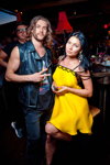 Buddha Bar Moscow (looks: blue jeans, black leather vest, yellow dress)