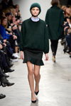 Baum und Pferdgarten show — Copenhagen Fashion Week AW14/15 (looks: green jumper, black mini skirt, black pumps)