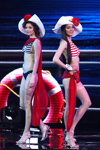 Hanna Semenyuk and Kristina Martinkevich. Swimsuit competition — Miss Belarus 2014 (looks: white hat, striped blue and white swimsuit, striped red and white swimsuit, silver sandals)