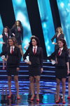 Victoria Miganovich, Yana Zhdanovich, Daria Fomina, Kaciaryna Zhirovskaya. Gala final — Miss Belarús 2014. Business style (looks: traje con falda negro, blusa blanca, corbata roja, zapatos de tacón rojos)