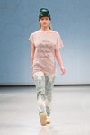 QooQoo show — Riga Fashion Week AW14/15 (looks: pink top with slogan, aquamarine knit cap)