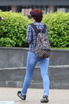 Minsk street fashion. 06/2014 (looks: checkered shirt, sky blue jeans, multicolored backpack)