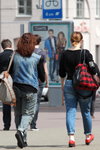 Minsk street fashion. 06/2014 (looks: denim blue vest, grey jeans, black jumper, sky blue jeans, red pumps)