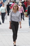 Minsk street fashion. 09/2014 (looks: white striped blouse, grey trousers, black ballerinas)