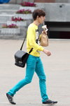 Minsk street fashion. 09/2014 (looks: black bag, turquoise jeans, yellow t-shirt, grey sneakers)