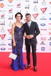 Winners and guests — Muz-TV Music Awards 2015. Gravity (looks: blueprintedevening dress with straps, silver bag, black men's suit, white shirt, checkered tie, brown dress boot; person: Slava)