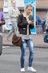 Gomel street fashion. 09/2015 (looks: white sneakers, blue ripped jeans, brown bag, striped top, black leather jacket)