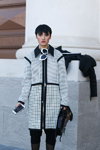 Street fashion. 21/10/2015 — Mercedes-Benz Fashion Week Russia (looks: checkered black and white coat, black bag)