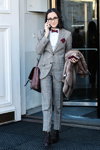 Street fashion. 21/10/2015 — Mercedes-Benz Fashion Week Russia (looks: white blouse, grey checkered pantsuit, burgundy bow-tie)