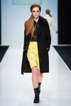 ELEMA show — Moscow Fashion Week FW16/17 (looks: black coat, black blouse, yellow pencil skirt, black boots)