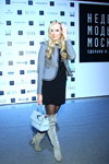 Olesya Boslovyak. Guests — Moscow Fashion Week FW16/17 (looks: blond hair, sky blue blazer, black dress, black tights, suede grey knee high boots, sky blue bag)