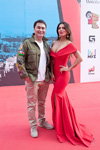 Arman Davletyarov and Anna Sedokova. Muz-TV Music Awards 2016. Future energy! (looks: khaki jacket, rednecklineevening dress)