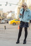 Street fashion. 11/03/2016 — Mercedes-Benz Fashion Week Russia (looks: sky blue fur coat, black tights)