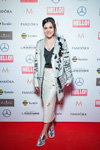 Adelina Sotnikova. Awards ceremony. Hello! (looks: white midi skirt, silver pumps, black top)