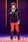 Philipp Kirkorov. Valentin Yudashkin. Performances of artists (looks: violet blazer, black boots, red trousers)
