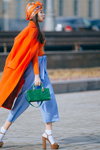 Street fashion. 03/2017 — MBFWRussia fw17/18 (looks: orange coat, sky blue trousers, green bag, white socks, brown sandals)