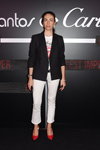Viviana Volpicella. Cartier Legendary Thrill party (looks: black blazer, white trousers, red pumps)