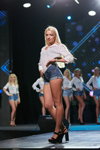 Miss Blonde Ukraine 2018 (looks: blue denim shorts, white blouse, black sandals)
