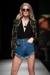 BLCV by Bulichev show — Riga Fashion Week SS19 (looks: Sunglasses, black neckline top, blue fringe denim shorts)