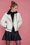 Dorothy Perkins AW17 lookbook (looks: black mini skirt, bun (hairstyle), black polka dot sheer tights, white biker jacket)