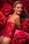 Honey Birdette Christmas 2018 lingerie lookbook (looks: red corset, red garter belt)