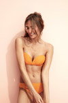 Princesse tam.tam SS18 lingerie lookbook (looks: orange swimsuit)