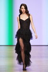 Yasya Minochkina show — MBFWRussia FW19/20 (looks: blackevening dress with slit, black polka dot tights, black sandals)