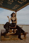 Lena Hardt. Chantelle SS19 lingerie campaign (looks: black bra, black trousers, black boots)