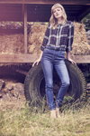 LolaLiza AW 19 campaign (looks: checkered multicolored blouse, blue jeans, black belt)