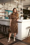 Orsay FW 19/20 campaign (looks: brown shirtdress, white lowboots)