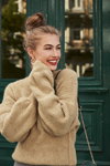 Orsay FW 19/20 campaign (looks: beige jumper, bun (hairstyle))