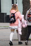 Minsk street fashion. 10/2019 (looks: black backpack, white skirt, white cheerleader overknees)