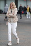 Minsk street fashion. 10/2019 (looks: beige quilted jacket, white jeans, beige sneakers)